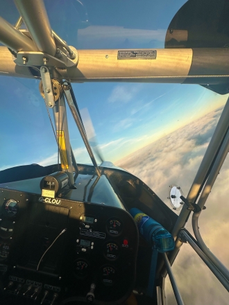 G-CLOUD, by Tom Dewhurst. Tom and dad Paul dancing above <br>the clouds over Sywell in G-CLOU, Flylight’s resident Skyranger Nynja.