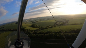 Turning final, by Andy Cooke. Andy turning final in his GT450 for his home field, a farm strip south of Swindon.