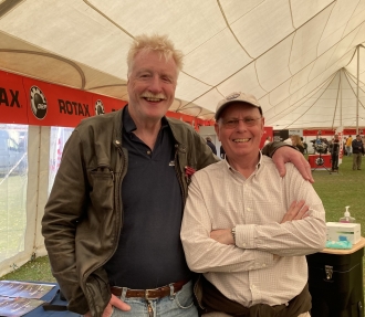 Feeling small, by Colin Laskey. Colin Laskey with MF Editor Geoff Hill at Popham. No, we haven’t a clue why he called the photo Feeling small either. <br>It was actually taken by BMAA Office Manager Kelly Thacker, but Colin sent it in for a laugh.