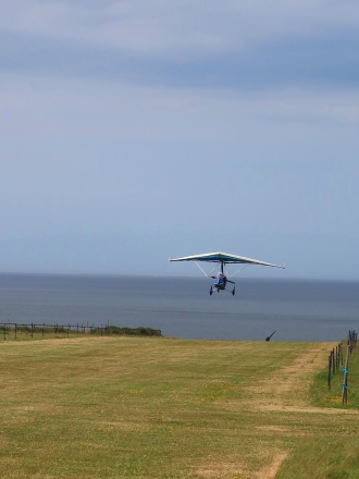 Weybourne, by Grant Finney “Ian Withers in his QuikR departing on Runway 16 at Weybourne airfield, Muckleburgh, <br>with the barrel of one of the three airfield defence guns clearly visible in the background,” said Grant.